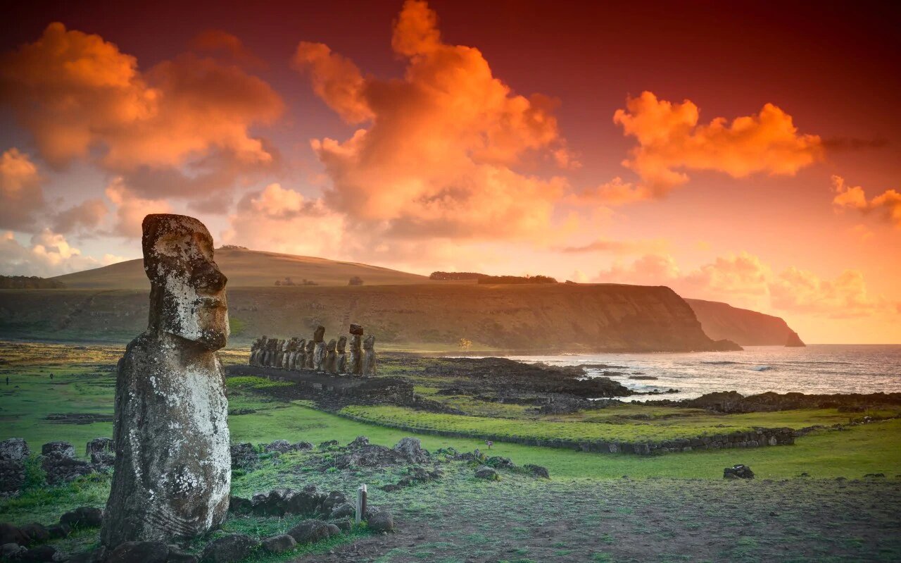 Ancient stone ruins in a mountainous South American landscape.